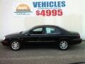 2003 Black Clearcoat Mercury Sable LS Premium Sedan  photo #4