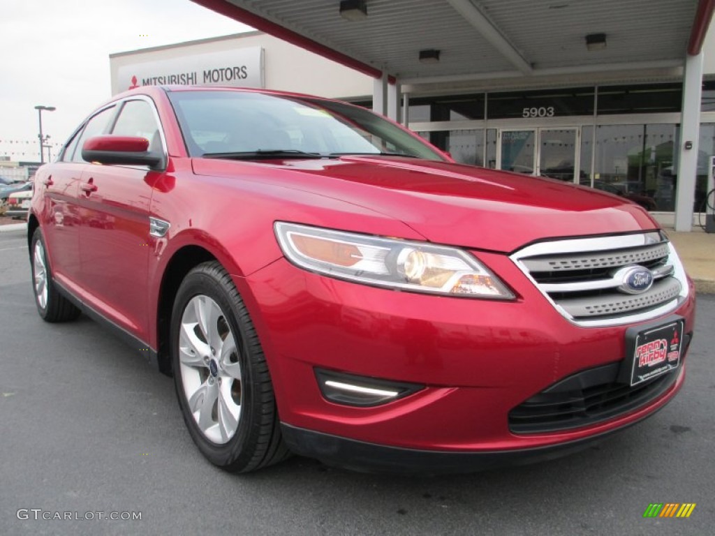 2010 Taurus SEL - Red Candy Metallic / Charcoal Black photo #1