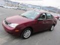 2006 Dark Toreador Red Metallic Ford Focus ZX4 SE Sedan  photo #5