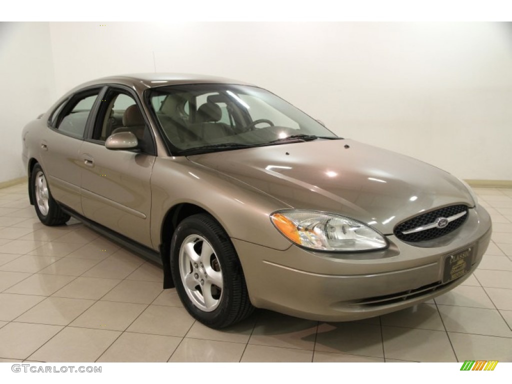 2003 Taurus SE - Arizona Beige Metallic / Medium Parchment photo #1