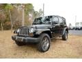 Black 2013 Jeep Wrangler Unlimited Oscar Mike Freedom Edition 4x4