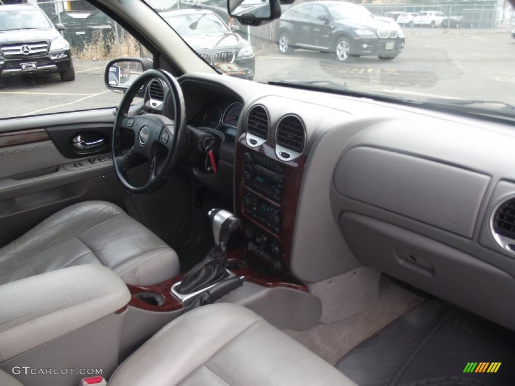 2006 Envoy XL SLT 4x4 - Cranberry Red Metallic / Light Tan/Ebony Black photo #16