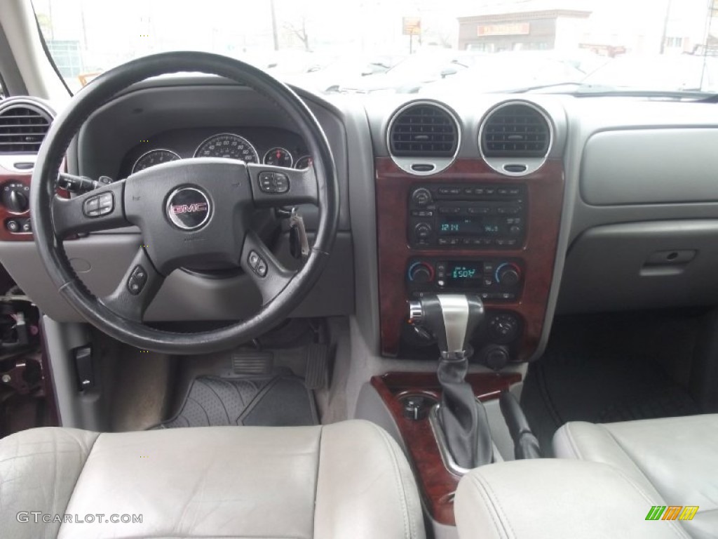 2006 Envoy XL SLT 4x4 - Cranberry Red Metallic / Light Tan/Ebony Black photo #49