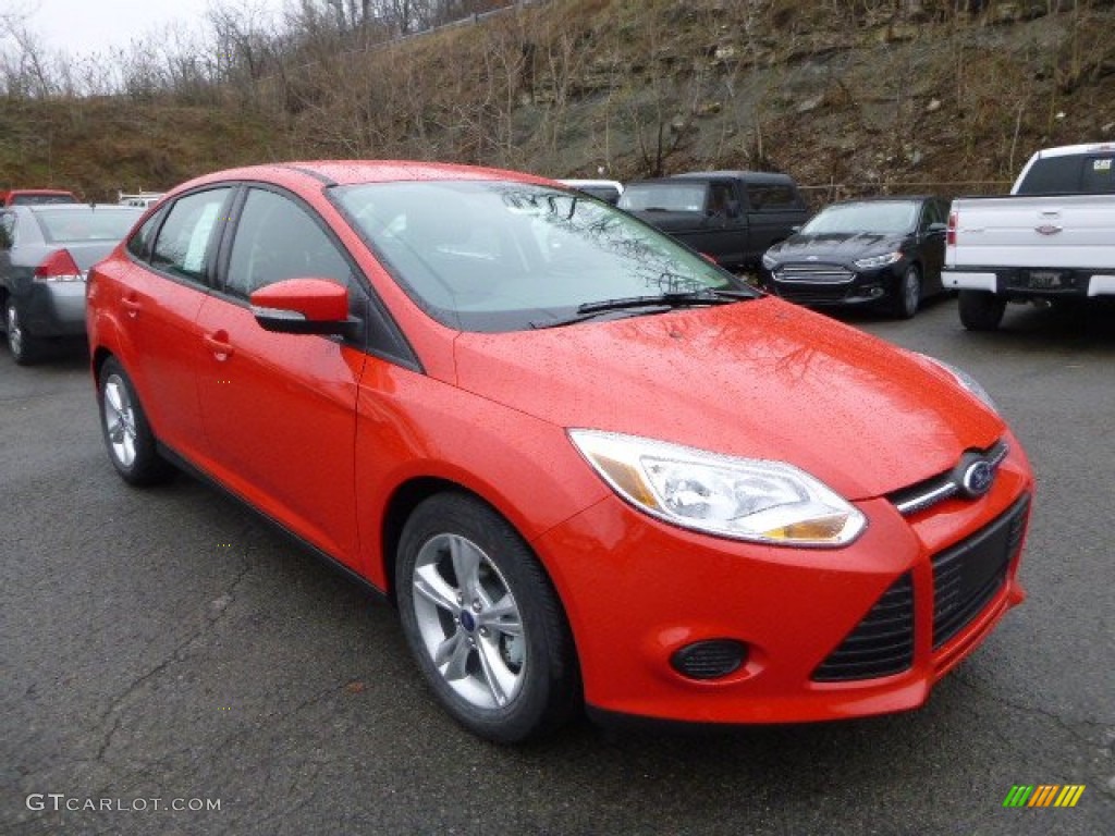 Race Red 2014 Ford Focus SE Sedan Exterior Photo #88578969