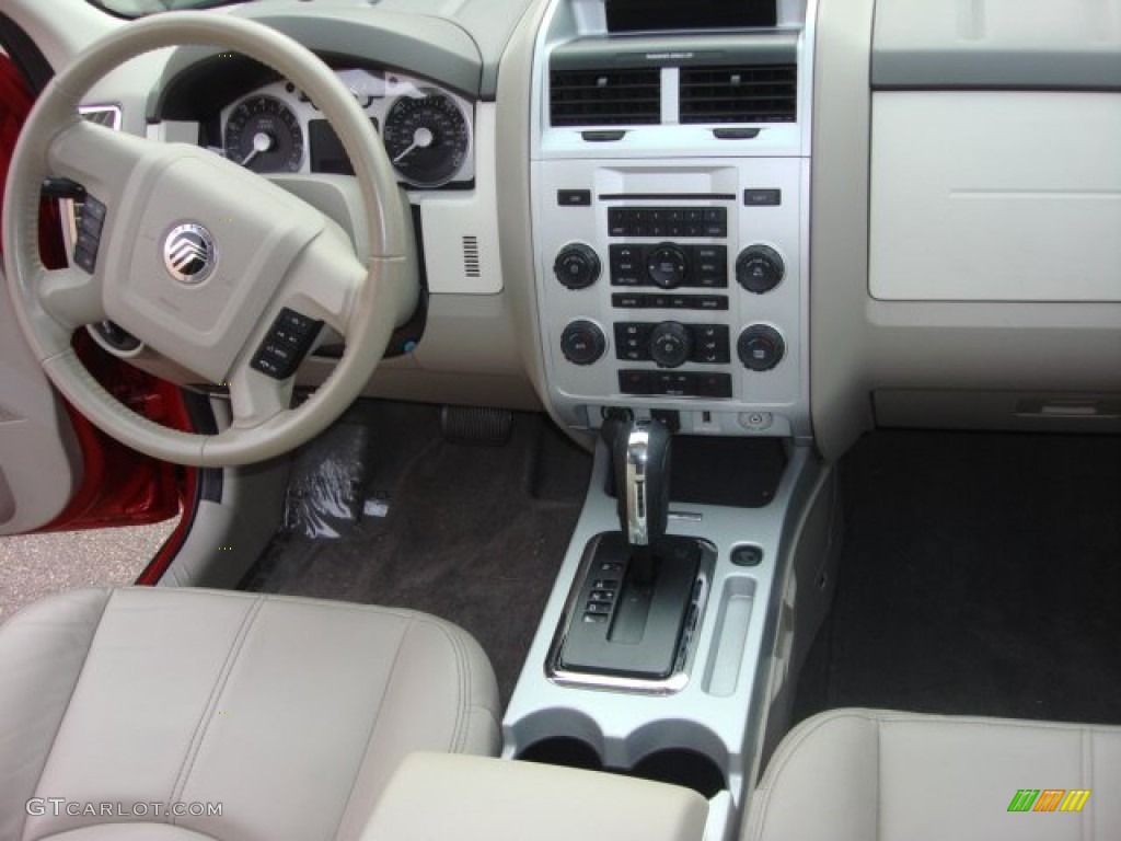 2010 Mariner V6 Premier 4WD - Sangria Red Metallic / Stone photo #15