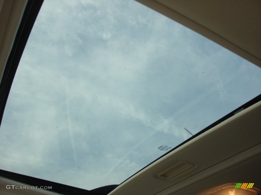 2010 Mariner V6 Premier 4WD - Sangria Red Metallic / Stone photo #17