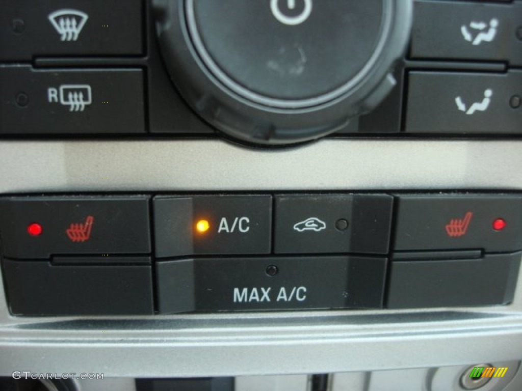 2010 Mariner V6 Premier 4WD - Sangria Red Metallic / Stone photo #21