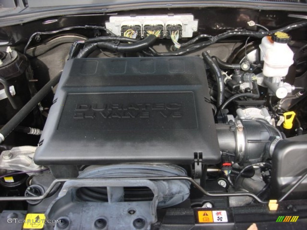 2010 Mariner V6 Premier 4WD - Sangria Red Metallic / Stone photo #30