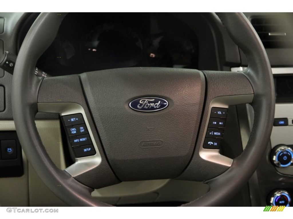 2012 Fusion SEL - Black / Medium Light Stone photo #6