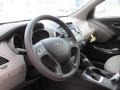 2014 Hyundai Tucson Beige Interior Steering Wheel Photo