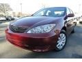 2006 Salsa Red Pearl Toyota Camry LE  photo #1