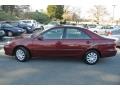 2006 Salsa Red Pearl Toyota Camry LE  photo #6