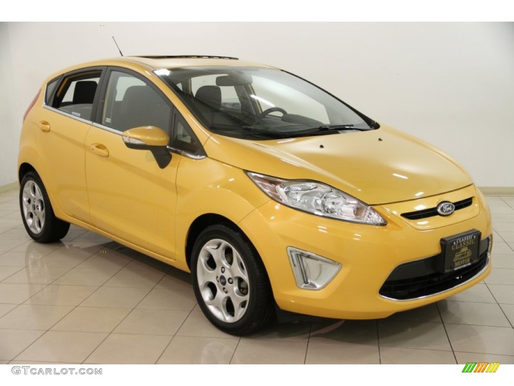 2011 Fiesta SES Hatchback - Yellow Blaze Metallic Tri-Coat / Charcoal Black/Blue Cloth photo #1