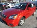 2010 Tropical Red Kia Rio LX Sedan  photo #2