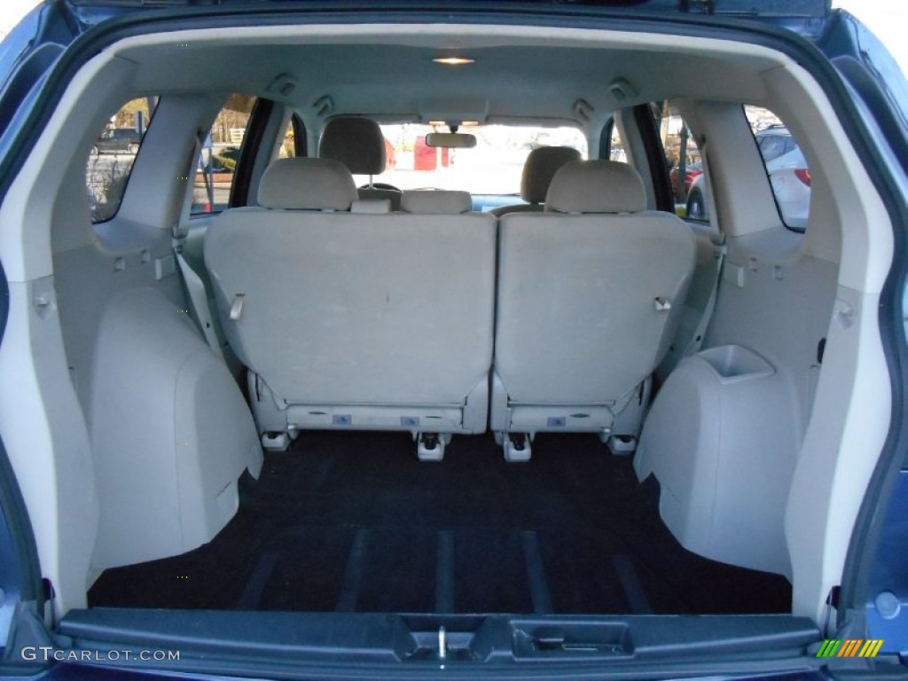 2007 Outlander LS 4WD - Deep Blue Metallic / Beige photo #18