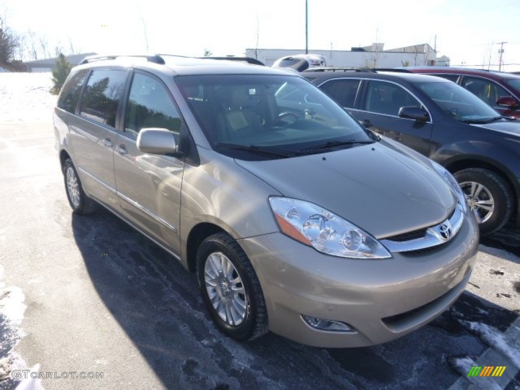 2010 Sienna XLE AWD - Desert Sand Mica / Taupe photo #1