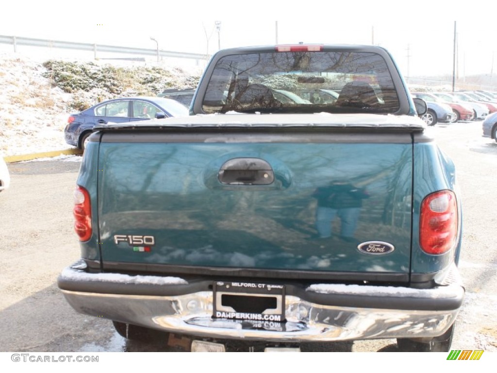 2000 F150 XLT Extended Cab 4x4 - Island Blue Metallic / Medium Graphite photo #7