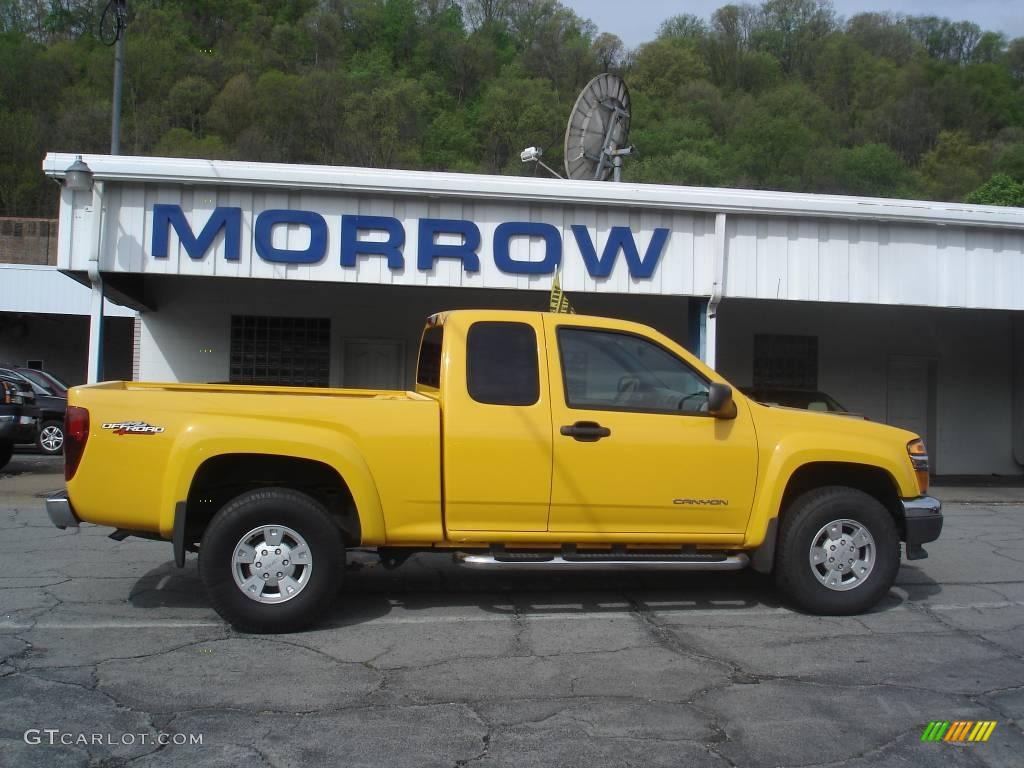 2005 Canyon SLE Extended Cab 4x4 - Flame Yellow / Dark Pewter photo #1