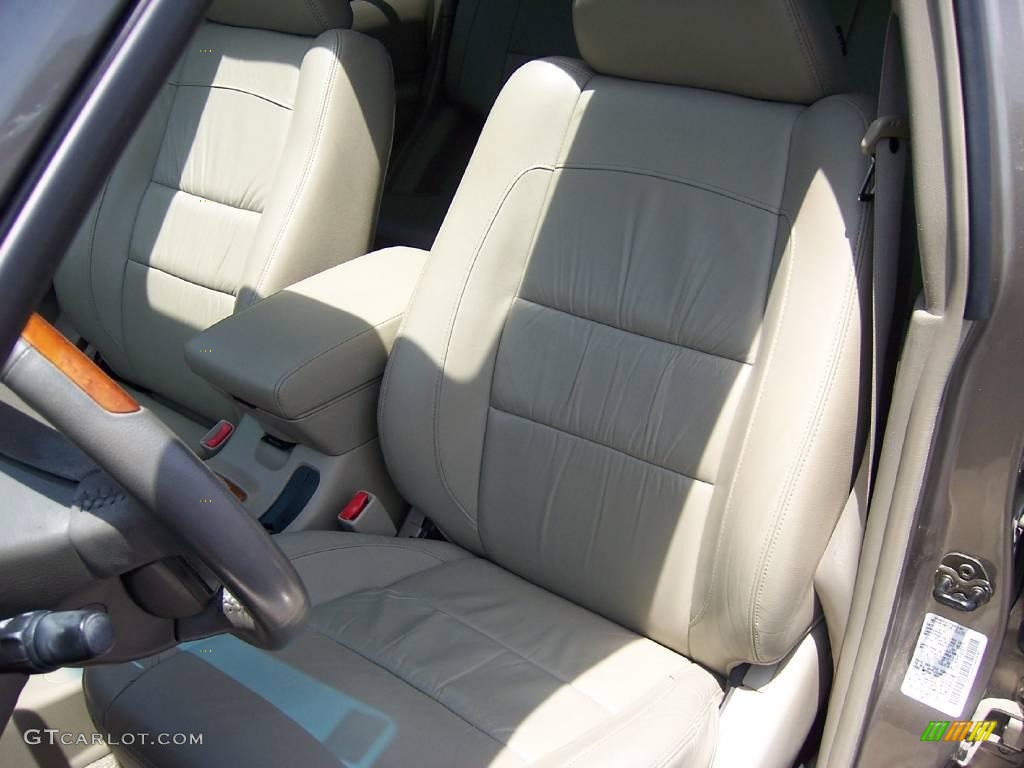 2003 QX4  - Bronze Metallic / Stone Beige photo #5