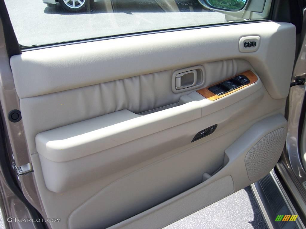 2003 QX4  - Bronze Metallic / Stone Beige photo #6