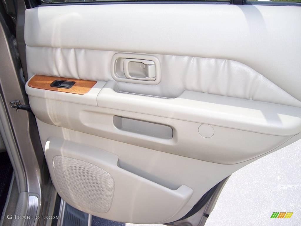 2003 QX4  - Bronze Metallic / Stone Beige photo #12