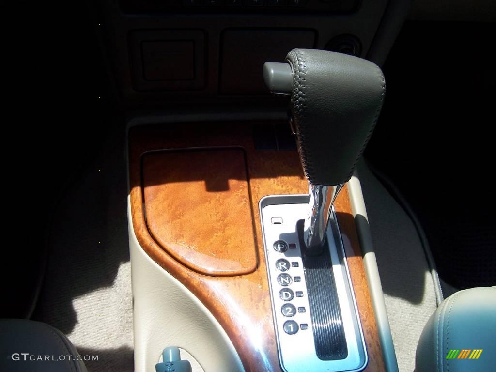 2003 QX4  - Bronze Metallic / Stone Beige photo #20