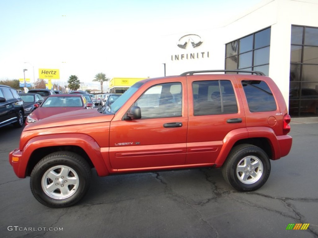 2002 Liberty Limited 4x4 - Salsa Red Pearlcoat / Dark Slate Gray photo #1