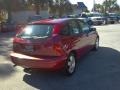 2004 Sangria Red Metallic Ford Focus ZX5 Hatchback  photo #5