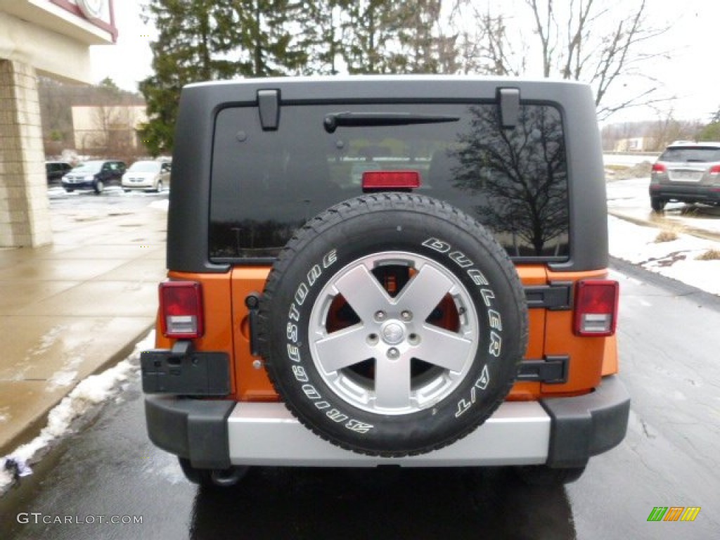 2011 Wrangler Sahara 4x4 - Mango Tango Pearl / Black photo #7