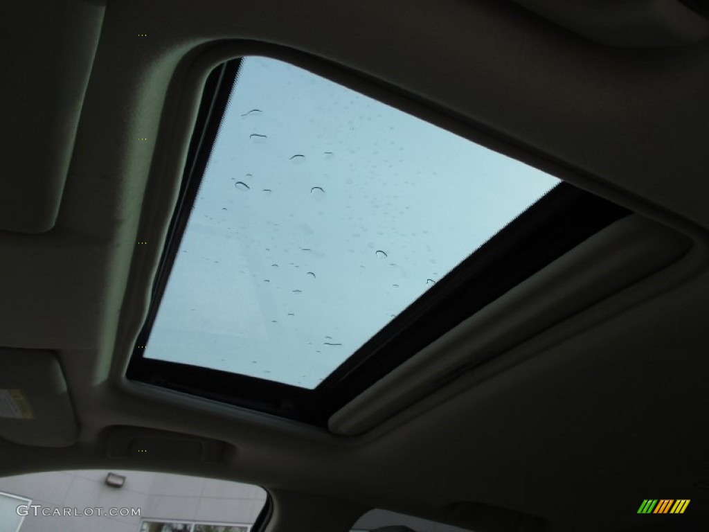 2007 Outlander XLS 4WD - Deep Blue Metallic / Beige photo #35