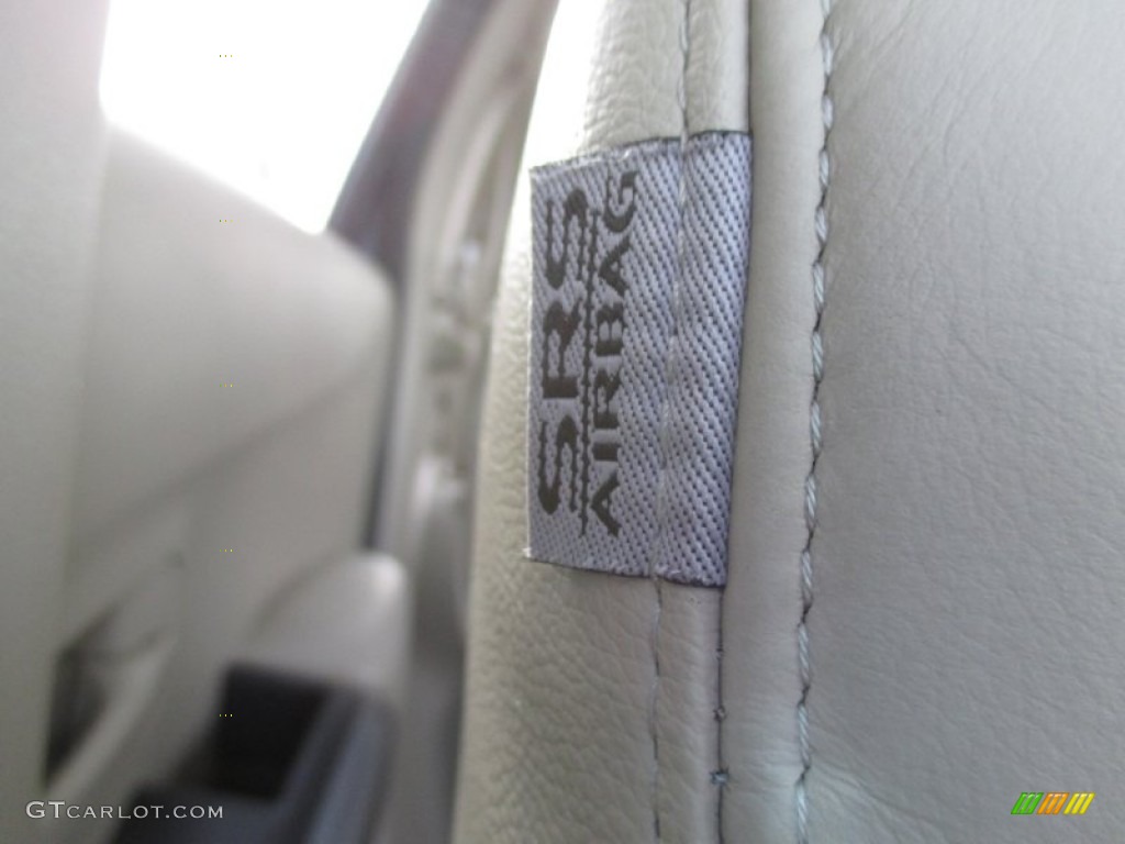 2007 Outlander XLS 4WD - Deep Blue Metallic / Beige photo #48