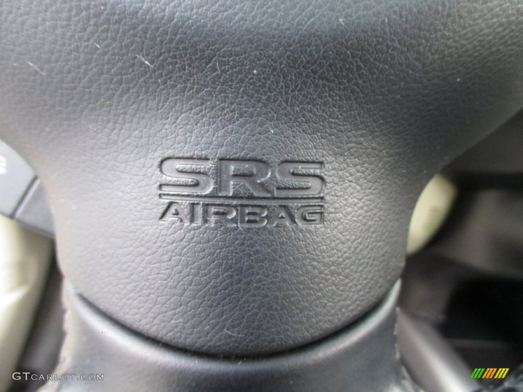 2007 Outlander XLS 4WD - Deep Blue Metallic / Beige photo #51