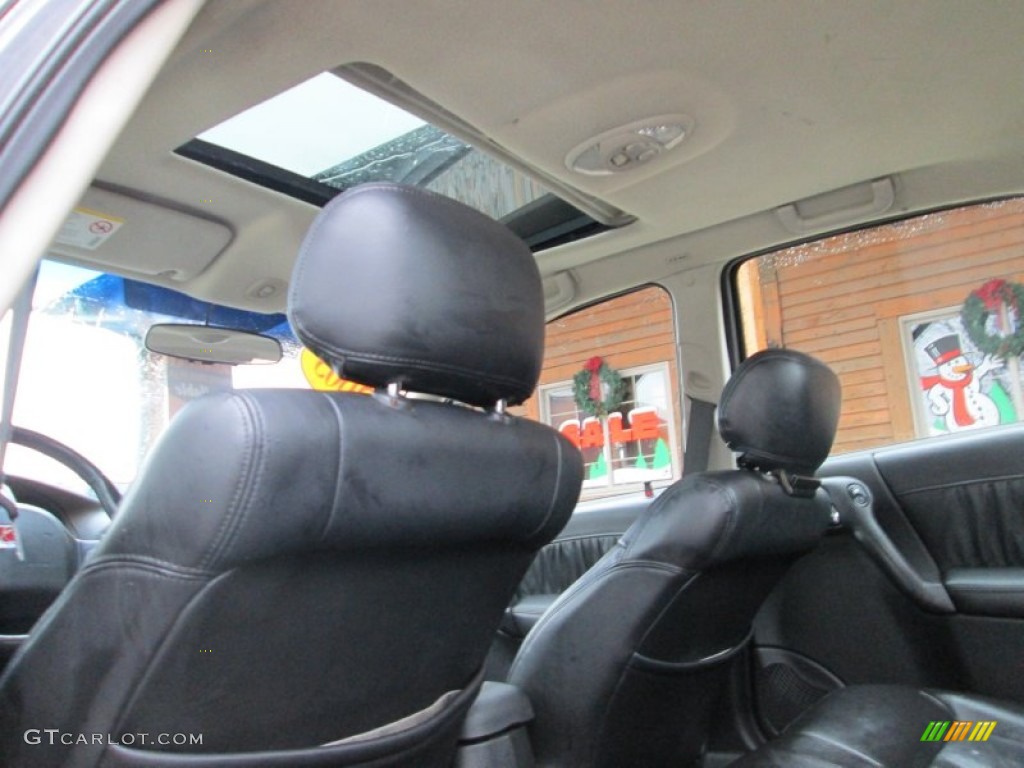 2003 L Series L300 Sedan - Black / Black photo #13
