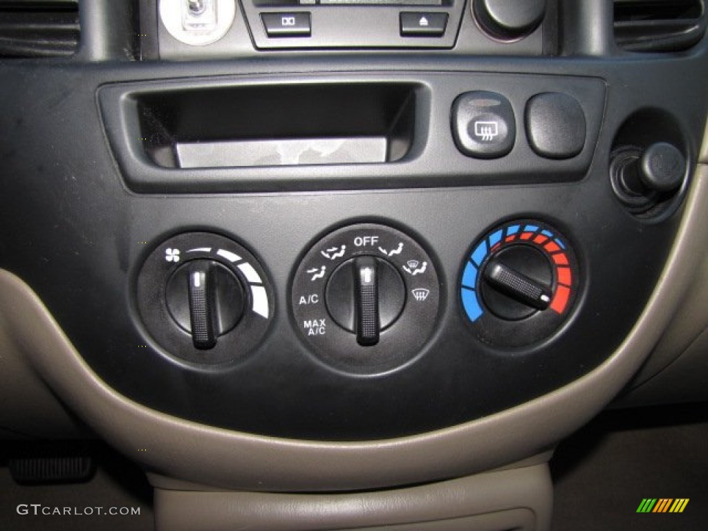 2002 Tribute ES V6 - Chestnut Metallic / Beige photo #17