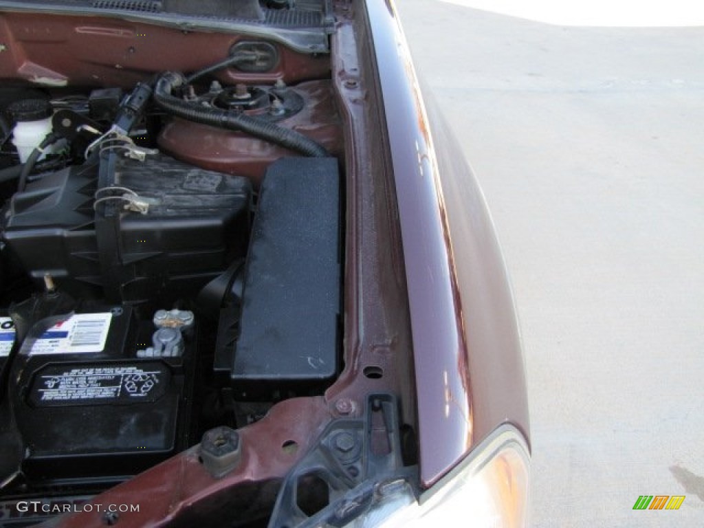 2002 Tribute ES V6 - Chestnut Metallic / Beige photo #36