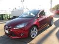 2014 Ruby Red Ford Focus Titanium Sedan  photo #1