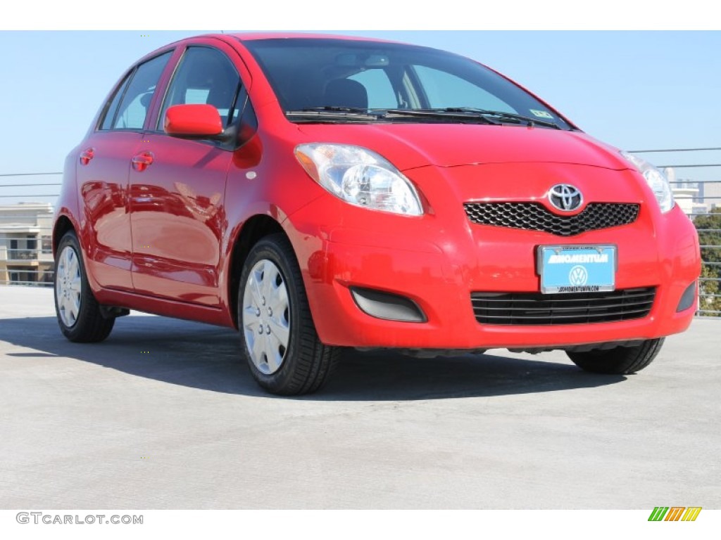 2009 Yaris 5 Door Liftback - Absolutely Red / Dark Charcoal photo #1