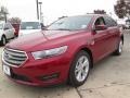 2014 Ruby Red Ford Taurus SEL  photo #1