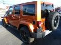 2011 Mango Tango Pearl Jeep Wrangler Unlimited Sahara 4x4  photo #3