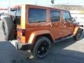 2011 Mango Tango Pearl Jeep Wrangler Unlimited Sahara 4x4  photo #5