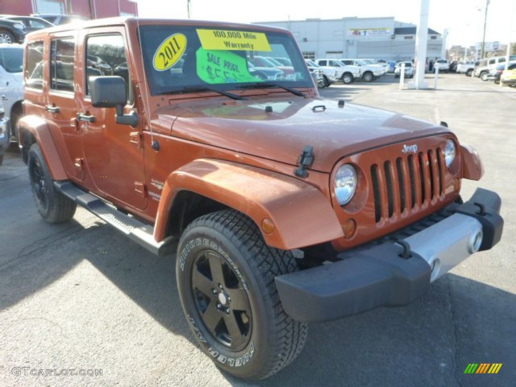 2011 Wrangler Unlimited Sahara 4x4 - Mango Tango Pearl / Black photo #8