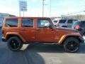 2011 Mango Tango Pearl Jeep Wrangler Unlimited Sahara 4x4  photo #10