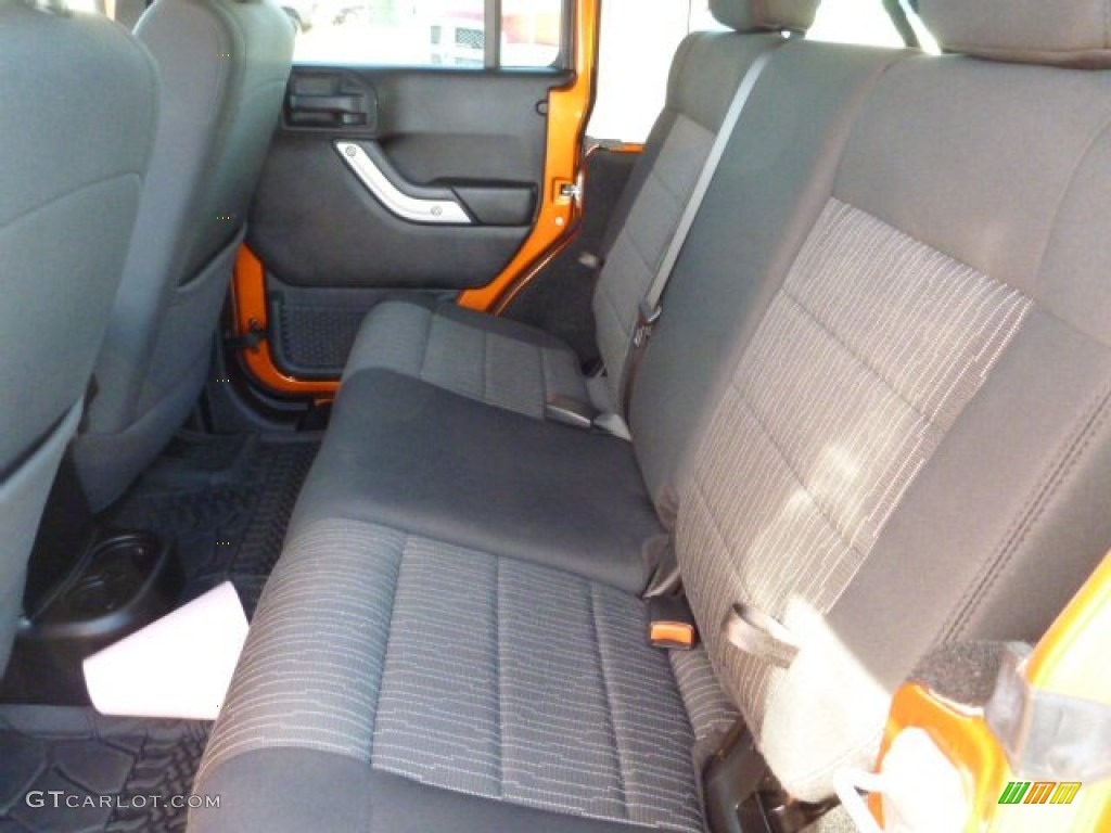 2011 Wrangler Unlimited Sahara 4x4 - Mango Tango Pearl / Black photo #12