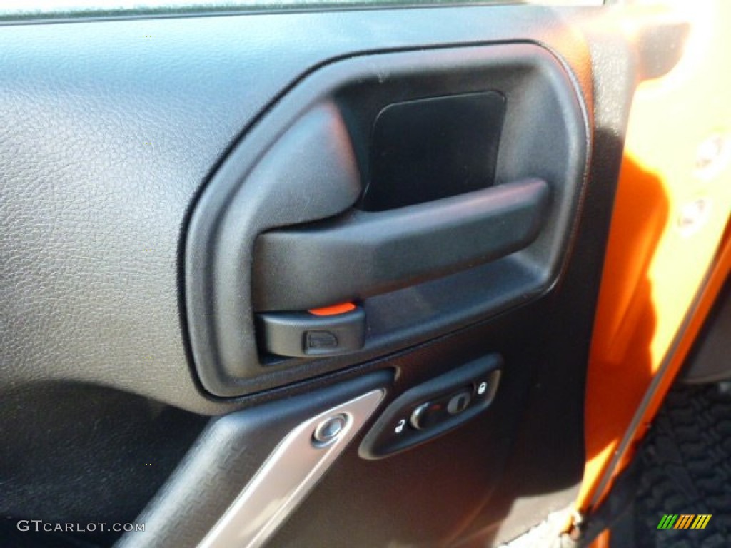 2011 Wrangler Unlimited Sahara 4x4 - Mango Tango Pearl / Black photo #14