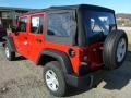 2014 Flame Red Jeep Wrangler Unlimited Sport 4x4  photo #3