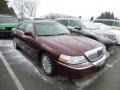 Autumn Red Metallic 2004 Lincoln Town Car Gallery
