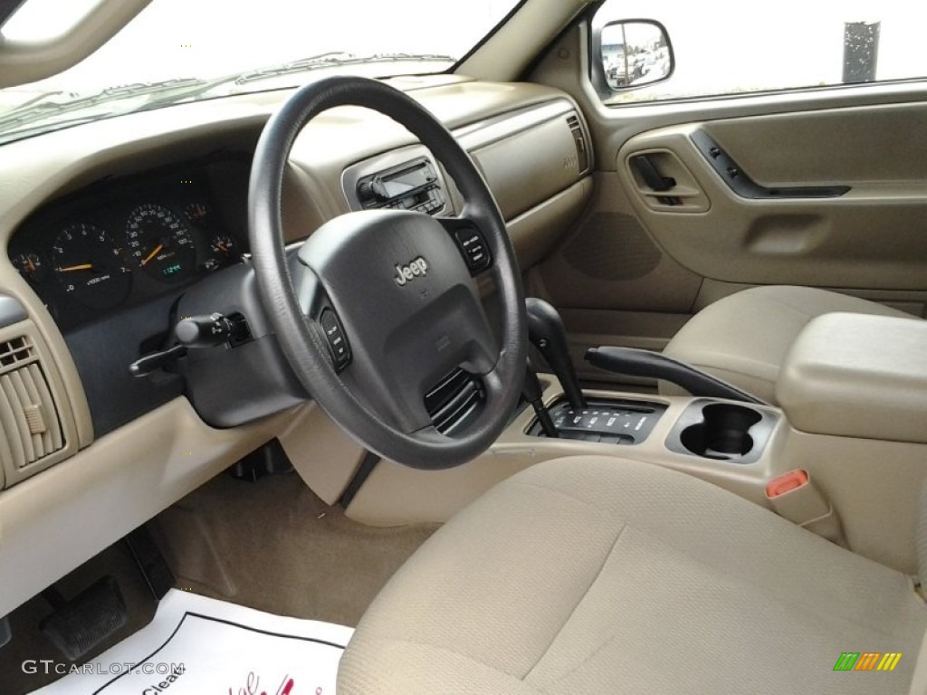 2003 Grand Cherokee Laredo 4x4 - Dark Garnet Red Pearl / Sandstone photo #14