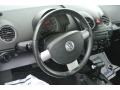 Black 2009 Volkswagen New Beetle 2.5 Coupe Steering Wheel