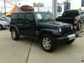2013 True Blue Pearl Jeep Wrangler Unlimited Sahara 4x4  photo #6