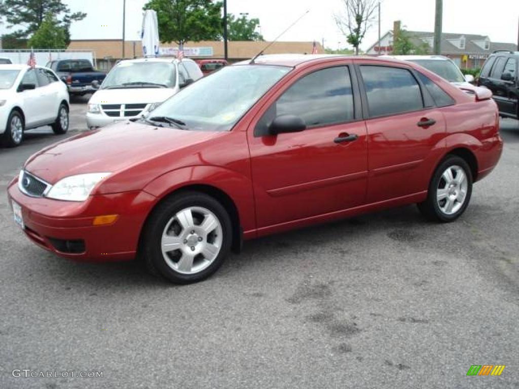 2005 Focus ZX4 SES Sedan - Sangria Red Metallic / Dark Pebble/Light Pebble photo #2